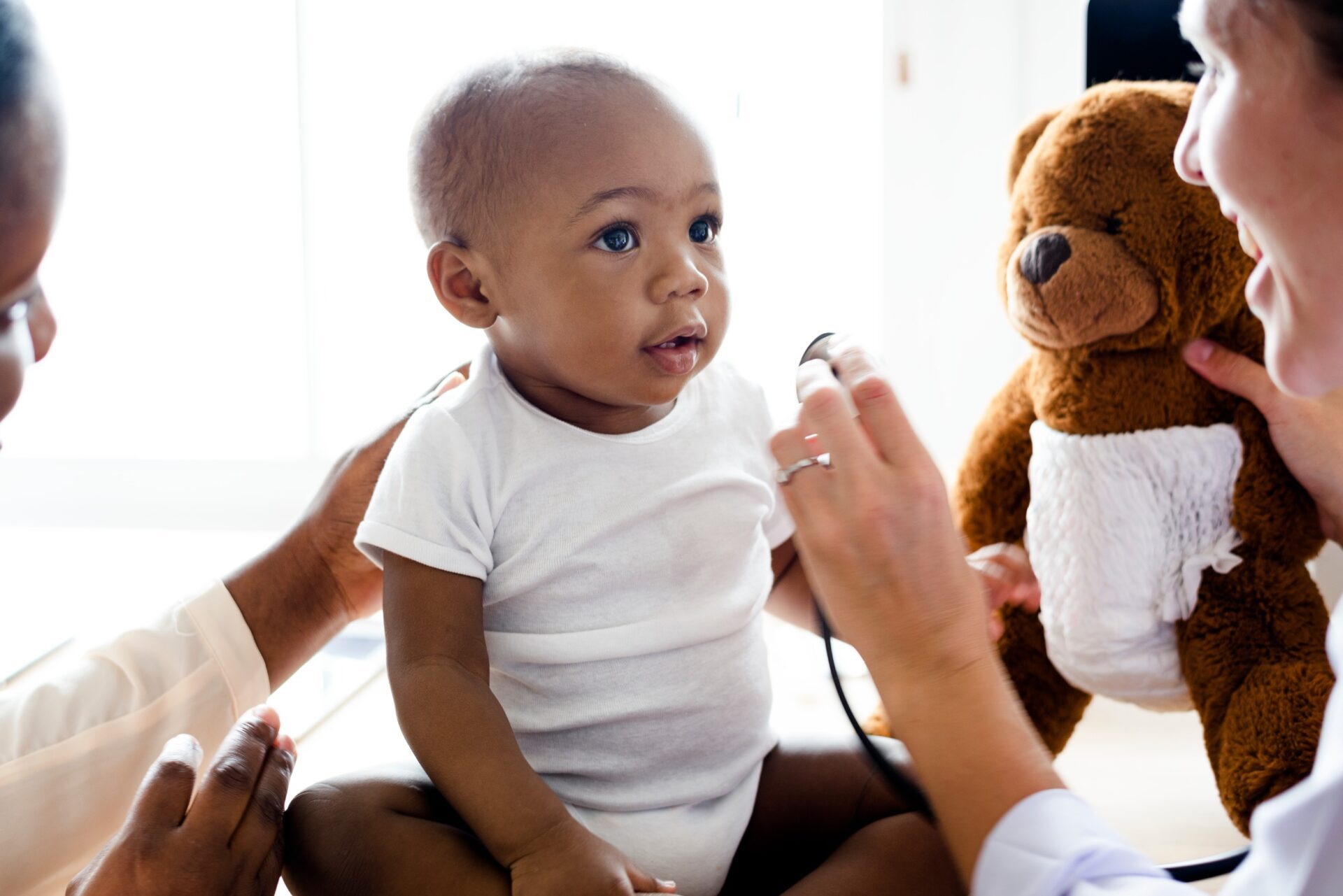 doctor seeing a baby